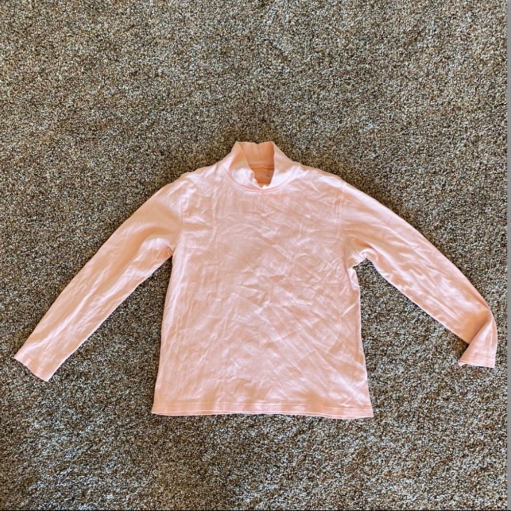 Pink turtleneck